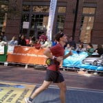 Dave crossing marathon finish line