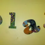 play in colorfully patterned letters